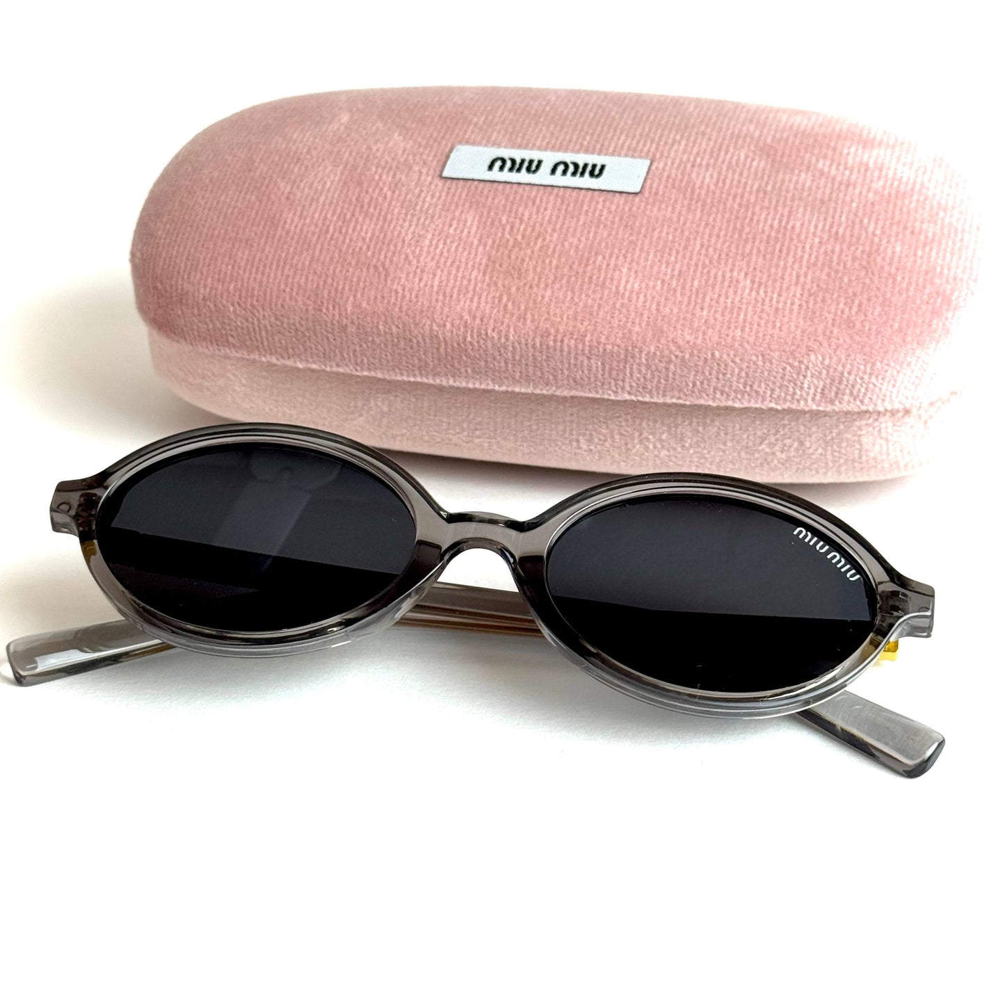 Miu Miu SMU10Q – Grey Transparent