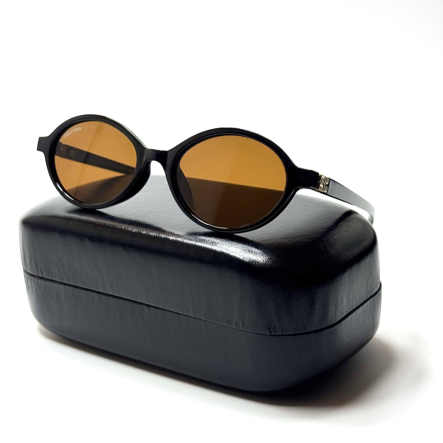Miu Miu Oval – Black Brown